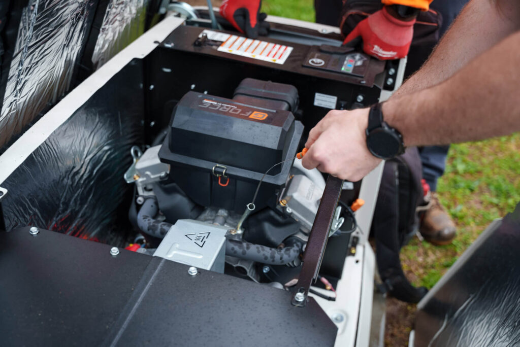 - 2nd Wind HVAC Technician checking a generator