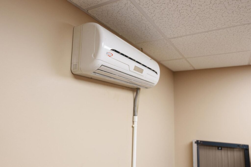 - 2nd Wind HVAC A Mini-Split unit mounted on a wall inside of a home or office