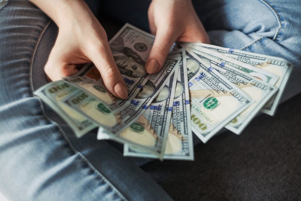 - 2nd Wind HVAC person holding money